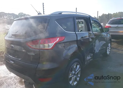 2016 Ford Escape Titanium z USA, uszkodzony, nr VIN 1FMCU0JX8GUA49040